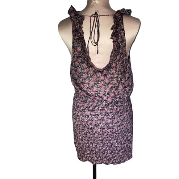 Free People sleeveless dress. Floral print on black. Size S. Stretchy skirt. - Picture 5 of 9